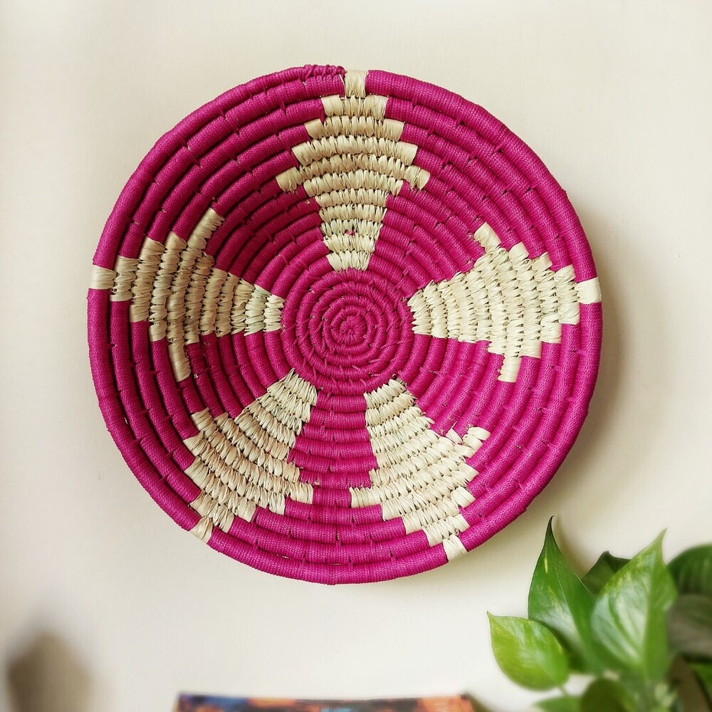 pink and white wall basket
